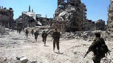 El pacto que permite a los rebeldes salir de Homs